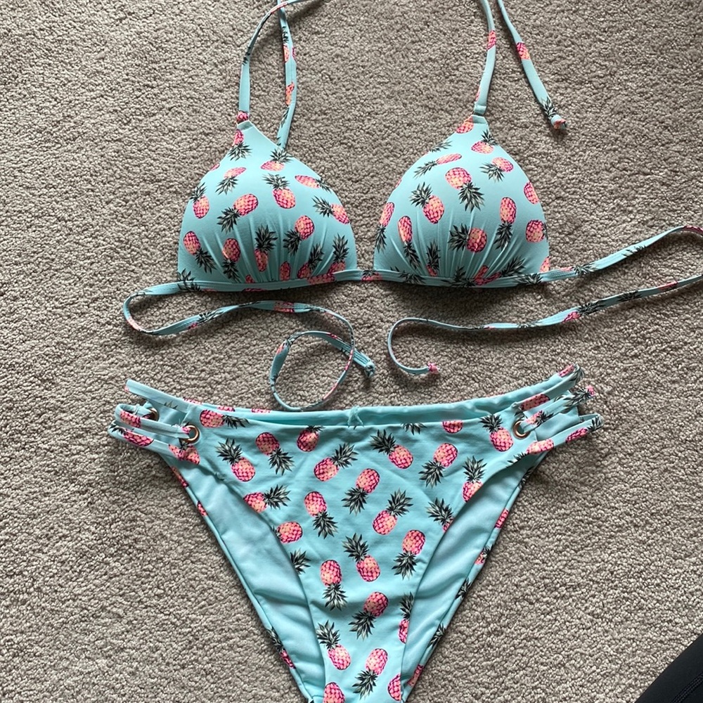 Ardene pineapple blue 2 pierce bikini. Size M inExcellent condition.